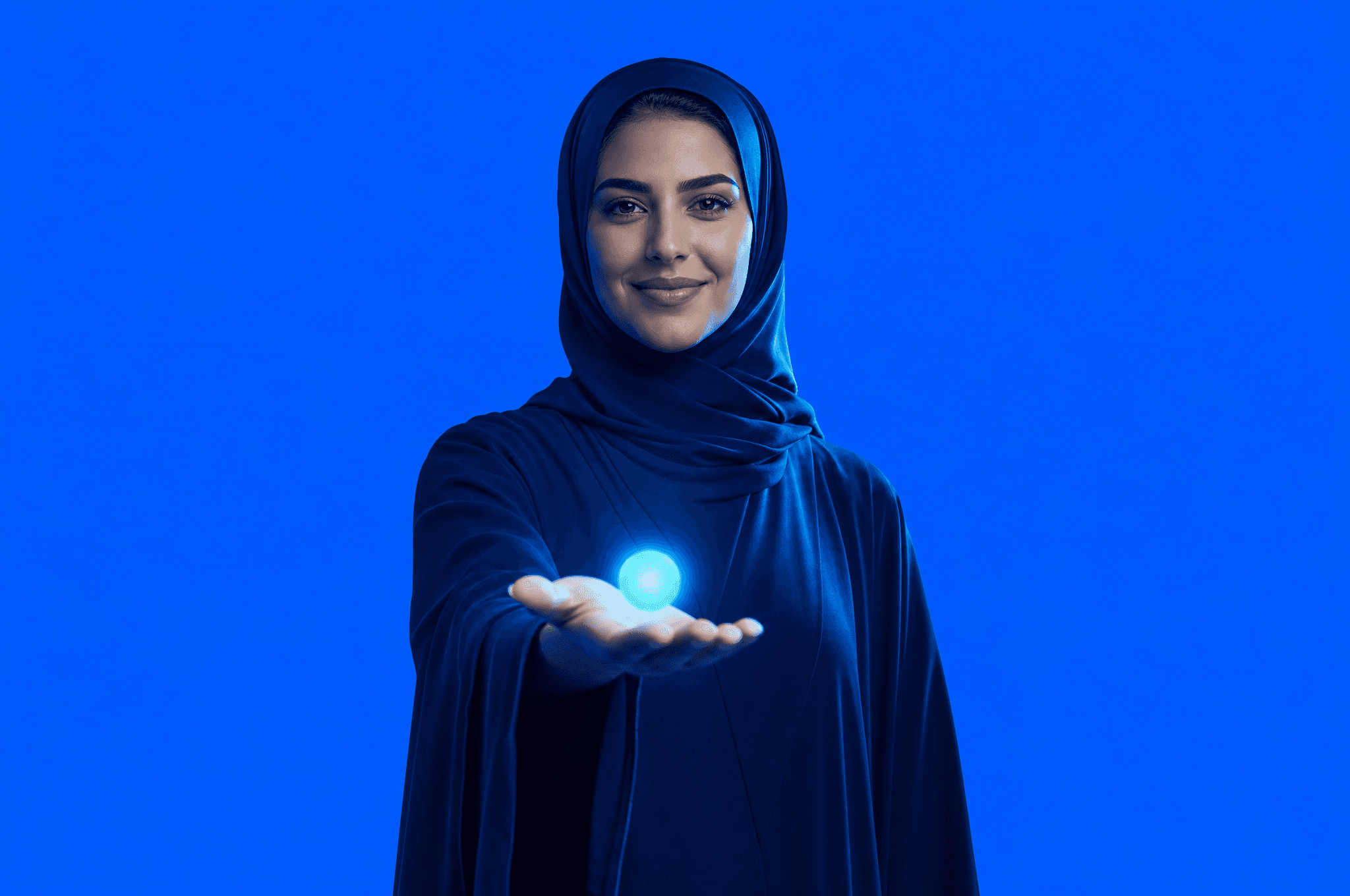 A Saudi operations manager in a navy abaya holding a small glowing light in her open palm, one job a company can hand to an AI agent